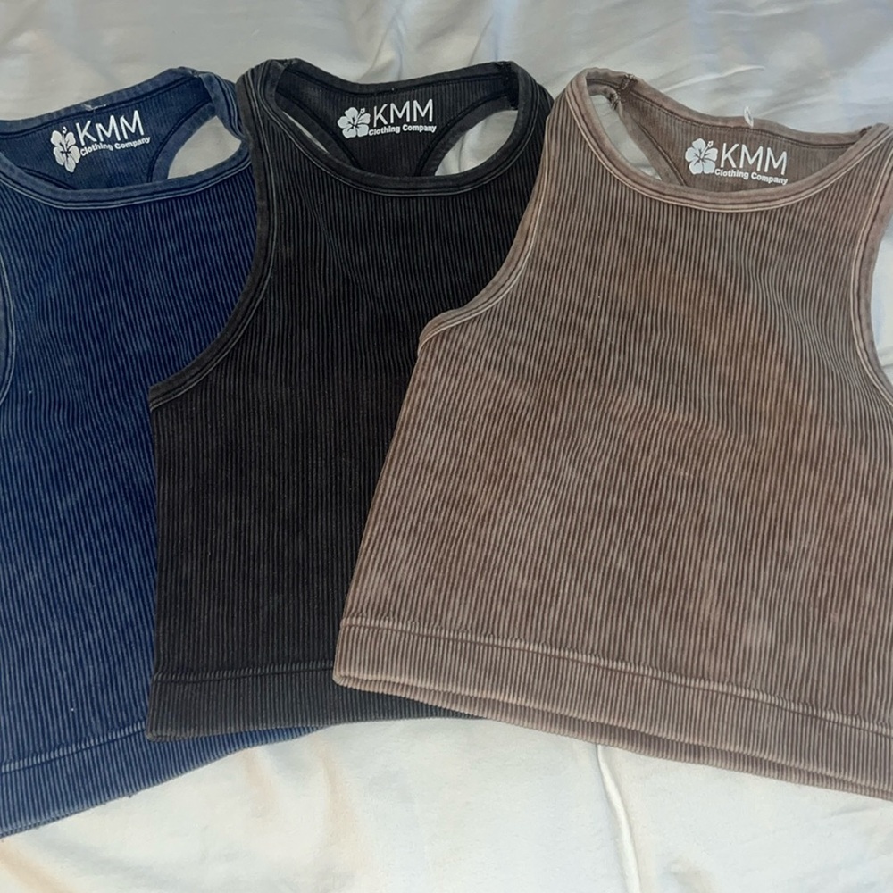 Three Pack of KMM shirts, size small.
